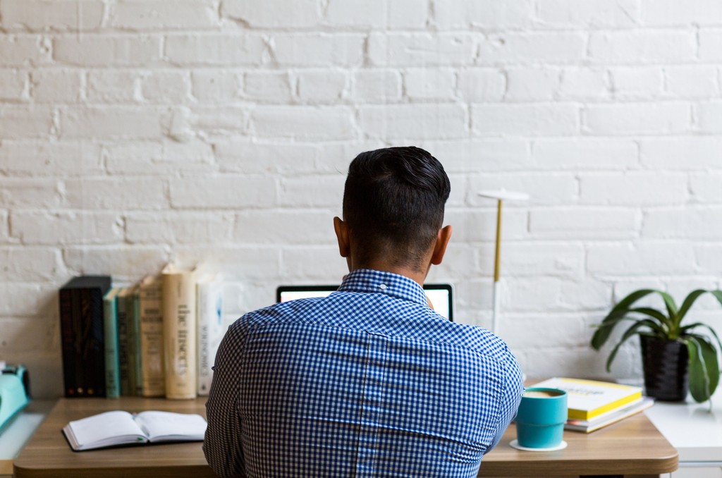 man working in laptop