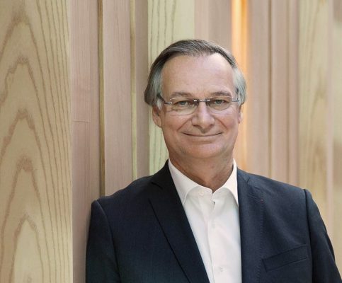 man on suit with glasses